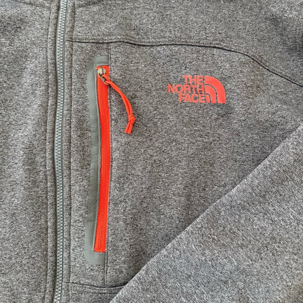 The North Face Gray Jacket fleece lined with Red Accents